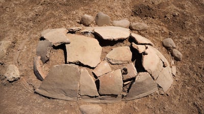 Ancient graves unearthed by members of the Dohuk Antiquities Department on the banks of Mosul Dam