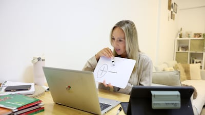 Sarah Noblett, from RGS Guildford Dubai, teaches her class during distance learning. There is no doubt that the Iran war has caused real disruption to education across the region. Chris Whiteoak / The National