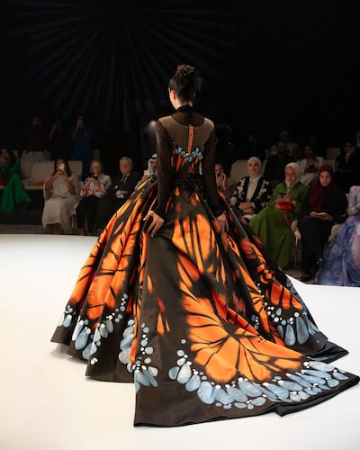 A full-skirted gown resembling butterfly wings by a designer part of the The National Fashion Clothing and Lifestyle of Iran. Photo: Abu Dhabi Modest Fashion Week.