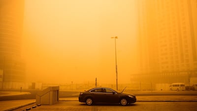 Buildings were barely visible in Barsha Heights in Dubai during a large storm that swept through the country, leaving poor visibility on and off the roads. Lee Hoagland / The National