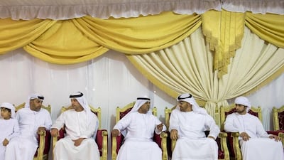 Sheikh Mohammed bin Zayed, Crown Prince of Abu Dhabi and Deputy Supreme Commander of the Armed Forces, offers condolences to the family of Mohamed Nasser Al Dhaheri, who died when his military helicopter crashed during a routine flight over international waters. Seen with Sheikh Hazza bin Zayed, Vice Chairman of the Abu Dhabi Executive Council. Rashed Al Mansoori / Crown Prince Court — Abu Dhabi