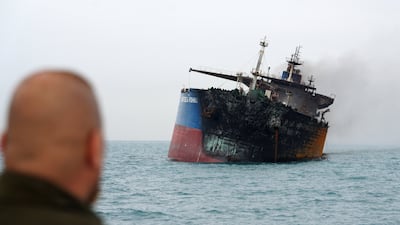 A tanker carrying Iraqi fuel oil burns after being struck in the country's waters. The Iran war has sparked a maritime crisis. Reuters