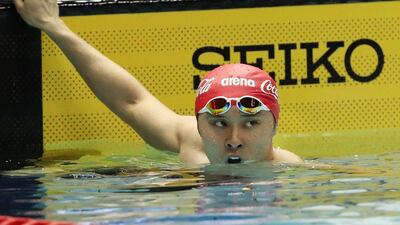 Kosuke Kitajima of Japan checks his time after finishing his men's breaststroke 200-metre final at the Japan national swimming championships in Tokyo. Jiji Press / AFP / April 8, 2016