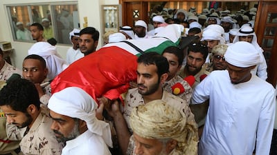 Family and friends carry the body of Al Falasi, 30, who was receiving treatment in Paris at the time of his death. Satish Kumar / The National