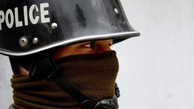 An Afghan policeman stands guard in central Kabul, Afghanistan. Jawad Jalali / AP Photo