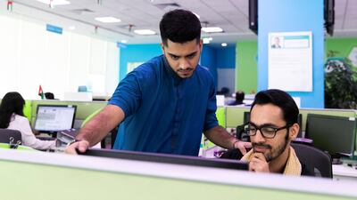 Zia Mirza is an integral part of the team at Tanfeeth after being helped to get a foot on the career ladder by Emirates NBD's Careers Network scheme. Reem Mohammed/The National