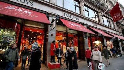 The early Christmas shoppers in Britain seemed unmindful of the creeping cold snap or the economic difficulties they face.