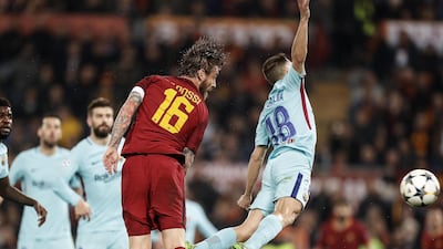 Roma's Daniele de Rossi, left, and Barcelona's Jordi Alba in action during their Uefa Champions League quarter-final second-leg match in Rome. Riccardo Antimiani / EPA