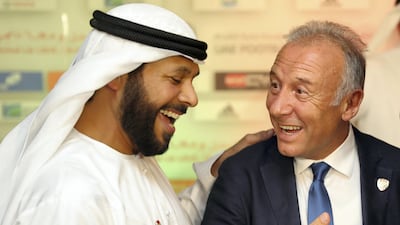 Alberto Zaccheroni in conversation with UAE FA president Marwan bin Ghalaita. Chris Whiteoak / The National