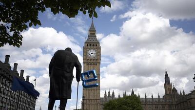 An EU balloon is tied to the Winston Churchill statue in Parliament Square. Neil Hall / Reuters