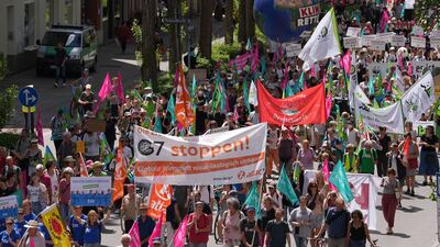 Climate activists and other protesters hold a rally in Munich on the sidelines of the G7 summit in Germany. AP