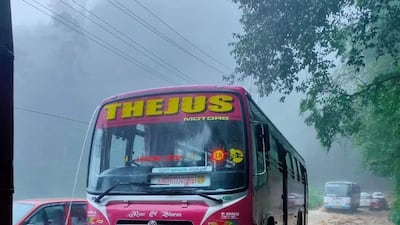 A bus makes its way along a flooded road. Five districts in Kerala are on high alert due to the dangers posed by flooding and landslides. Photo @AdvkShreeKanth via Twitter