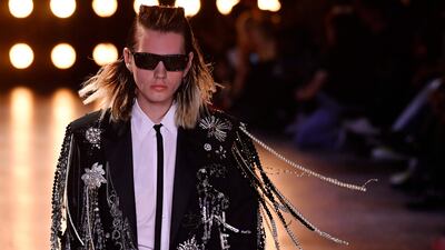 The collection was crammed with clothes imbued with an androgynous rock spirit. AFP