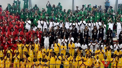 Youth clap the hands during a meeting with Pope Francis at the Interreligious meeting with the Youth at the Maxaquene Pavillion in Maputo. AFP