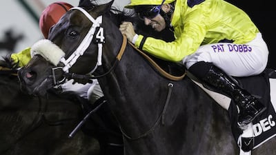 Patrick Dobbs rides Indescribable to victory in the Gee Whizz handicap at Abu Dhabi Equestrian Club ion March 12, 2017. Christopher Pike / The National