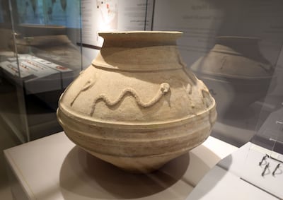 Snakes are a prevalent theme throughout the items found at Saruq Al Hadid. Chris Whiteoak / The National