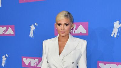 Kylie Jenner, in a white Tom Ford blazer dress, attends the 2018 MTV Video Music Awards at Radio City Music Hall on August 20, 2018 in New York City. AFP