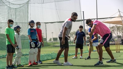 Ahmed Raza works on basics of the game at the Rajasthan Royals Academy. Antonie Robertson / The National
