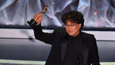 South Korean director Bong Joon-ho accepts the award for Best International Feature Film for 'Parasite' at the 92nd Academy Awards on Sunday, February 9. AFP