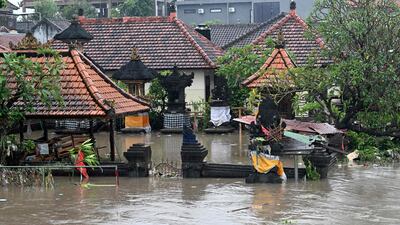 A Hindu temple is inundated in Denpasar. AFP