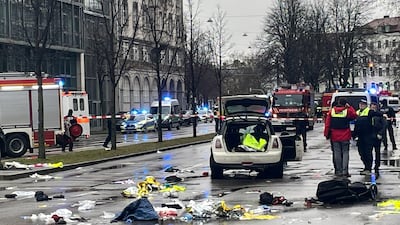 Police secure the area as debris litters the scene. Reuters