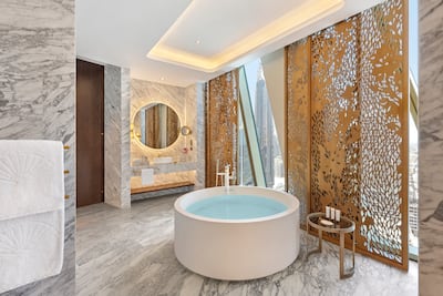 A spacious bathroom overseeing Sheikh Zayed Road. Photo: Mandarin Oriental