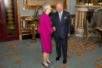 Irish president Catherine Connolly shakes hands with King Charles during an audience at Buckingham Palace in London on Monday. Reuters