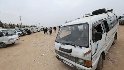 A minibus leaves. About 800 people make the journey each day from the regime side, while roughly the same number leave from the rebel area, said Munir, who runs the bus station. Joseph Eid / AFP Photo