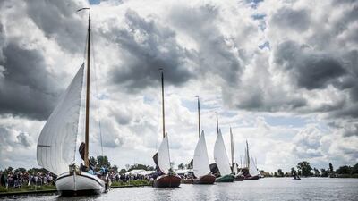 Boats competing during the first race of the skutsjesilen competition, a traditional boat race of sailing yachts from several Frisian cities, in De Veenhoop, the Netherlands. Siese Veenstra / EPA
