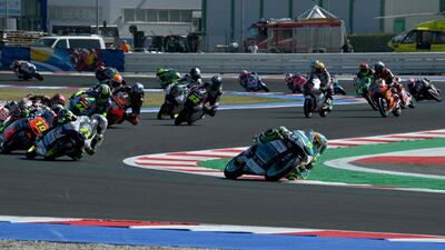 Leopard Racing Spanish rider Jaume Masia (L) followed by Liqui Moly Husqvarna Intact GP Japanese rider Ayumu Sasaki compete during the San Marino Moto3 race at the Misano World Circuit Marco-Simoncelli in Misano Adriatico. AFP