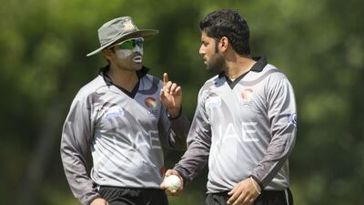 Khurram Khan, left, provided 85 runs for UAE on Tuesday, with Mohammad Naveed, right, taking three wickets. Chris Young / The National