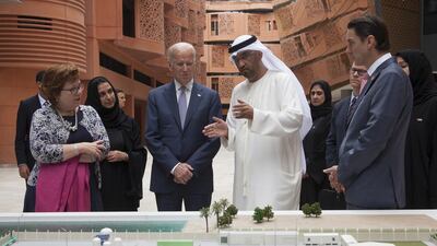 Joe Biden speaks with Dr Sultan Ahmed Al Jaber, Minister of State and Chairman of Masdar, second right, during a tour of Masdar City. Seen with them are Dr Nawal Al Hosany, second left, and Barbara Leaf, US ambassador to the UAE. Razan Al Zayani for Crown Prince Court - Abu Dhabi