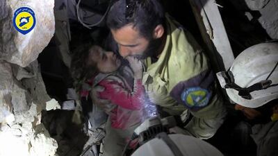A civil defence worker pulls Ghazal Qassem from beneath the rubble. About 100,000 children are trapped in Aleppo’s rebel-held eastern districts. Only 30 doctors remain in opposition-held neighbourhoods, which translates to one physician per 10,000 people. AP Photo