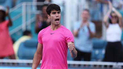 Carlos Alcaraz celebrates after his victory over Dusan Lajovic in the Miami Open third round at Hard Rock Stadium on March 26, 2023. AFP