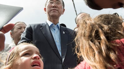Secretary-General Ban Ki-moon (centre) and his wife Yoo Soon-taek (behind, left) stand among a group of children from a Lebanese family living in the Hay el Tanak settlement in Tripoli, Lebanon. Hay el Tanak is home to at least 2400 refugees from different populations, including vulnerable Lebanese, Syrian refugees, Lebanese and Syrian nomads, as well as a small group of Palestinian families.