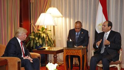 Donald Trump meets the Egyptian President Abdel Fattah El Sisi in New York in September. Mr El Sisi is the only Arab leader who has held talks with the Republican candidate since he started his presidential campaign. / AFP PHOTO / DOMINICK REUTER