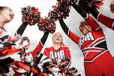 Burn up to 700 calories with a cheerleading workout at Dolphin Sports Academy. Getty Images