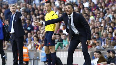 Barcelona manager Luis Enrique directs his side during their La Liga win over Real Sociedad on Saturday. Quique Garcia / AFP