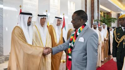 Mohamed Mubarak Al Mazrouei, Undersecretary of the Crown Prince Court of Abu Dhabi greets Emmerson Mnangagwa, President of Zimbabwe, during a reception at the Presidential Airport. Ryan Carter for the Ministry of Presidential Affairs