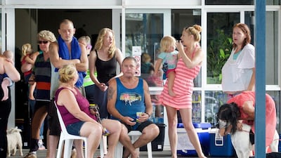 Residents from Waroona and the surrounding area outside a bush fire evacuation centre at the Murray Leisure Centre in Pinjarra. Richard Wainwright / EPA