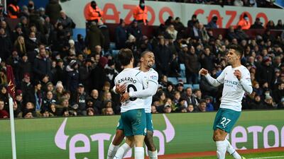 Bernardo Silva celebrates with teammates Gabriel Jesus and Joao Cancelo after scoring Manchester City's second goal. Getty Images