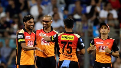 Sunrisers Hyderabad player Sandeep Sharma, left celebrates after Evin Lewis's wicket against Mumbai Indians during VIVO IPL cricket T20 match in Mumbai, India, Tuesday, April 24, 2018. (AP Photo/Rajanish Kakade)