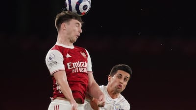 Arsenal's Kieran Tierney wins a header. Getty