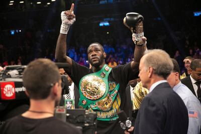 Deontay Wilder celebrates after knocking out Bermane Stiverne in the first round of the WBC heavyweight title bout. Kevin Hagen / AP Photo