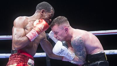 Jamel Herring of USA hitting Carl Framptonn of Northern Ireland at the Rotunda, Ceasar's Palace, Bluewaters Island, Dubai. Leslie Pableo for The National