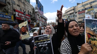 Relatives of Palestinian detainees held in Israeli jails stage a rally in the occupied West Bank city of Nablus. EPA