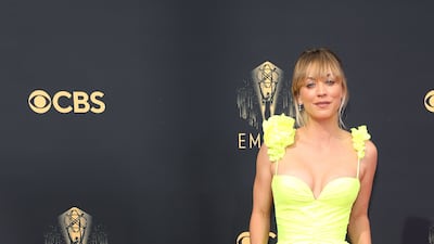 Kaley Cuoco brought the colour in a neon yellow look by Vera Wang. AFP