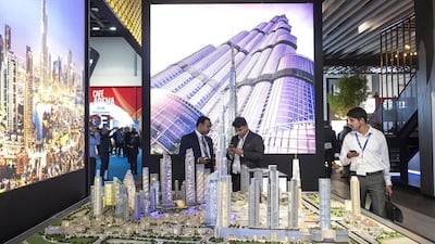 Above, Emaar's Downtown Dubai scheme being showcased at Cityscape Global. Antonie Robertson / The National