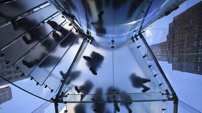 People stream into the Apple store on 5th Avenue on Black Friday in New York. Carlo Allegri / Reuters