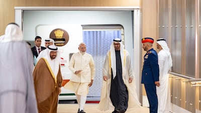 Sheikh Mohamed receives Mr Modi at the Presidential Airport